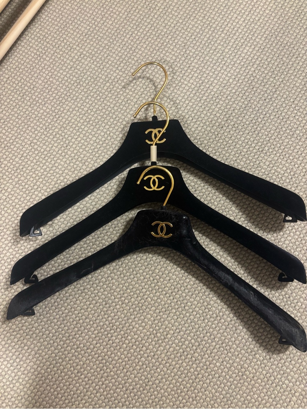 CHANEL Black and Gold Velvet Hangers with Signature CC Emblems
